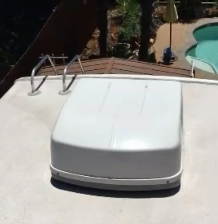 RV roof surface showing wear and discoloration before applying RV Roof Magic liquid rubber sealant