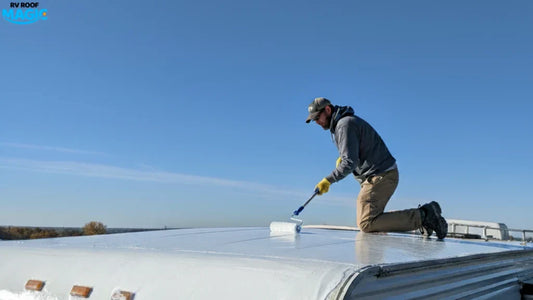 man applying rv roof sealant
